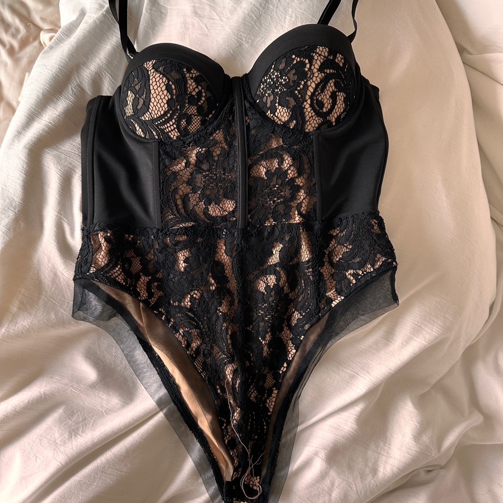 Pink and black lace bodysuit